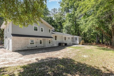 LOOK!!! PRICE REDUCTION! LOWEST PRICED 4 BEDROOM HOME IN on Wedgefield Plantation Golf Club in South Carolina - for sale on GolfHomes.com, golf home, golf lot