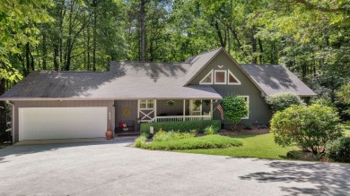 Located in the heart of Sapphire Valley, this well-maintained on Sapphire National Golf Club in North Carolina - for sale on GolfHomes.com, golf home, golf lot