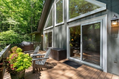 Located in the heart of Sapphire Valley, this well-maintained on Sapphire National Golf Club in North Carolina - for sale on GolfHomes.com, golf home, golf lot