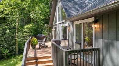 Located in the heart of Sapphire Valley, this well-maintained on Sapphire National Golf Club in North Carolina - for sale on GolfHomes.com, golf home, golf lot