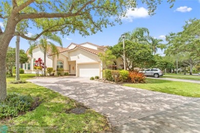 Very rarely available corner villa overlooking a canal and the on Palm-Aire Country Club and Resort - The Oaks in Florida - for sale on GolfHomes.com, golf home, golf lot