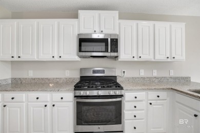 Golf course living and beach life converge at this immaculately on Glenlakes Golf Club in Alabama - for sale on GolfHomes.com, golf home, golf lot