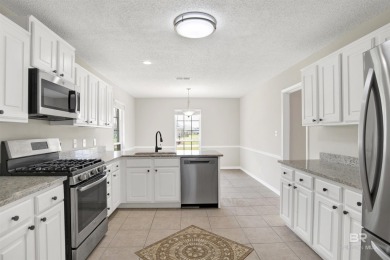 Golf course living and beach life converge at this immaculately on Glenlakes Golf Club in Alabama - for sale on GolfHomes.com, golf home, golf lot