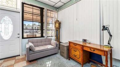 A golf cart is included, offering convenient access around the on The Rookery At Marco in Florida - for sale on GolfHomes.com, golf home, golf lot