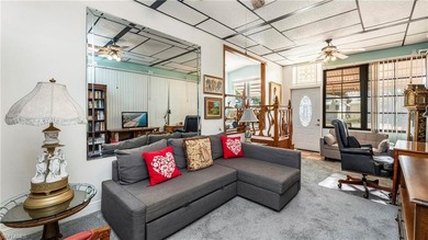 A golf cart is included, offering convenient access around the on The Rookery At Marco in Florida - for sale on GolfHomes.com, golf home, golf lot