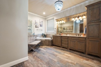 This Luxurious 5-Bedroom Home in Pecan Plantation with Upscale on Pecan Plantation Country Club in Texas - for sale on GolfHomes.com, golf home, golf lot