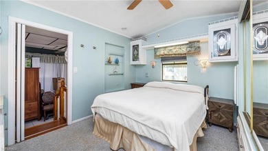 A golf cart is included, offering convenient access around the on The Rookery At Marco in Florida - for sale on GolfHomes.com, golf home, golf lot