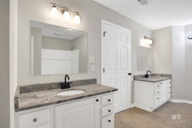 Golf course living and beach life converge at this immaculately on Glenlakes Golf Club in Alabama - for sale on GolfHomes.com, golf home, golf lot