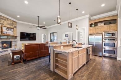 This Luxurious 5-Bedroom Home in Pecan Plantation with Upscale on Pecan Plantation Country Club in Texas - for sale on GolfHomes.com, golf home, golf lot