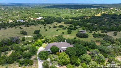 Discover this equestrian estate, nestled on 9.48 fully fenced on The Clubs of Cordillera Ranch in Texas - for sale on GolfHomes.com, golf home, golf lot