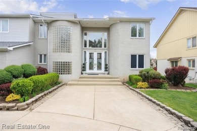 Magnificent, contemporary style Colonial 6 bedrooms (2 in Fin on Tam O Shanter Country Club in Michigan - for sale on GolfHomes.com, golf home, golf lot