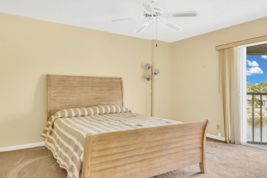 PRICED TO SELL! Enjoy this 2 bedroom lakefront condo with large on Poinciana Golf Club in Florida - for sale on GolfHomes.com, golf home, golf lot
