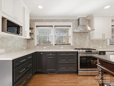 THIS IS THE ONE! It's on the 14th fairway of the south course of on Raintree Country Club in North Carolina - for sale on GolfHomes.com, golf home, golf lot