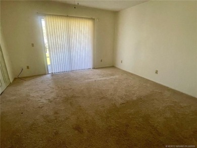 Enjoy the breeze on the screened lanai of this 1/1 2nd floor on Pine Lakes Golf Club in Florida - for sale on GolfHomes.com, golf home, golf lot