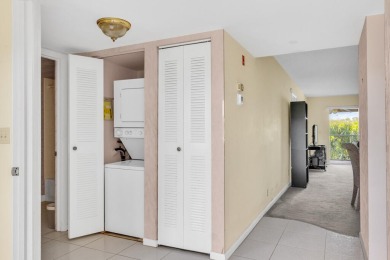 PRICED TO SELL! Enjoy this 2 bedroom lakefront condo with large on Poinciana Golf Club in Florida - for sale on GolfHomes.com, golf home, golf lot