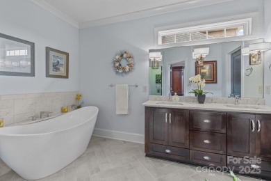 Grand arched stone entry with slate steps and covered porch on Cramer Mountain Country Club in North Carolina - for sale on GolfHomes.com, golf home, golf lot