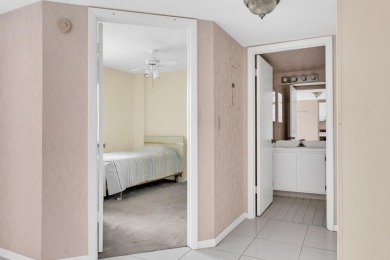 PRICED TO SELL! Enjoy this 2 bedroom lakefront condo with large on Poinciana Golf Club in Florida - for sale on GolfHomes.com, golf home, golf lot