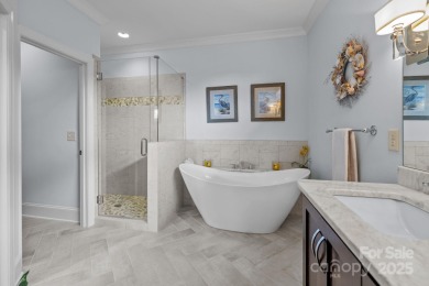Grand arched stone entry with slate steps and covered porch on Cramer Mountain Country Club in North Carolina - for sale on GolfHomes.com, golf home, golf lot