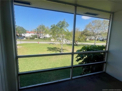 Enjoy the breeze on the screened lanai of this 1/1 2nd floor on Pine Lakes Golf Club in Florida - for sale on GolfHomes.com, golf home, golf lot