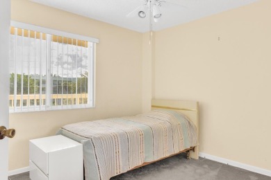 PRICED TO SELL! Enjoy this 2 bedroom lakefront condo with large on Poinciana Golf Club in Florida - for sale on GolfHomes.com, golf home, golf lot