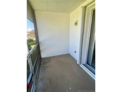Enjoy the breeze on the screened lanai of this 1/1 2nd floor on Pine Lakes Golf Club in Florida - for sale on GolfHomes.com, golf home, golf lot