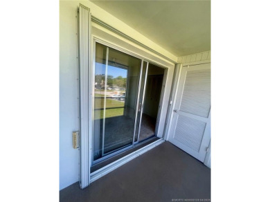 Enjoy the breeze on the screened lanai of this 1/1 2nd floor on Pine Lakes Golf Club in Florida - for sale on GolfHomes.com, golf home, golf lot