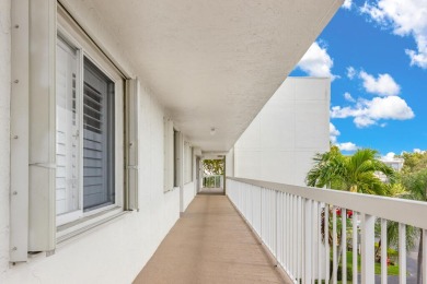 PRICED TO SELL! Enjoy this 2 bedroom lakefront condo with large on Poinciana Golf Club in Florida - for sale on GolfHomes.com, golf home, golf lot