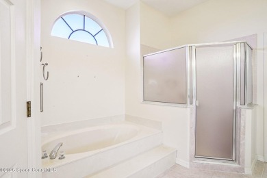 MUST SEE - Suntree Pool Home with Golf  Water Views | NEW ROOF on Baytree National Golf Links in Florida - for sale on GolfHomes.com, golf home, golf lot