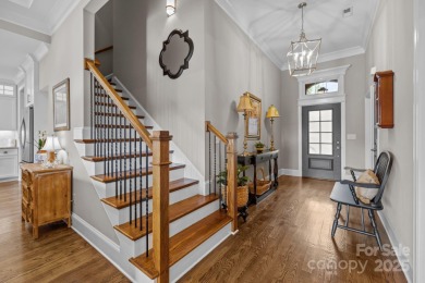 Grand arched stone entry with slate steps and covered porch on Cramer Mountain Country Club in North Carolina - for sale on GolfHomes.com, golf home, golf lot