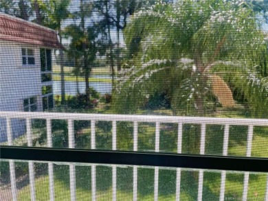Enjoy the breeze on the screened lanai of this 1/1 2nd floor on Pine Lakes Golf Club in Florida - for sale on GolfHomes.com, golf home, golf lot