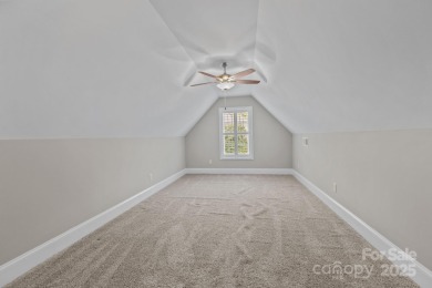 Grand arched stone entry with slate steps and covered porch on Cramer Mountain Country Club in North Carolina - for sale on GolfHomes.com, golf home, golf lot