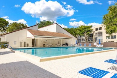 PRICED TO SELL! Enjoy this 2 bedroom lakefront condo with large on Poinciana Golf Club in Florida - for sale on GolfHomes.com, golf home, golf lot