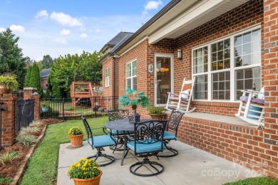 Grand arched stone entry with slate steps and covered porch on Cramer Mountain Country Club in North Carolina - for sale on GolfHomes.com, golf home, golf lot