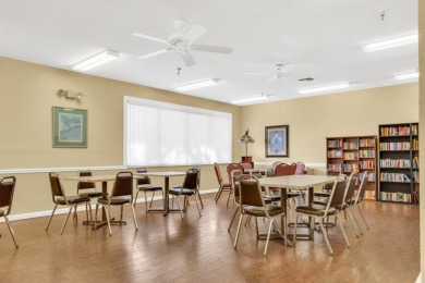 PRICED TO SELL! Enjoy this 2 bedroom lakefront condo with large on Poinciana Golf Club in Florida - for sale on GolfHomes.com, golf home, golf lot