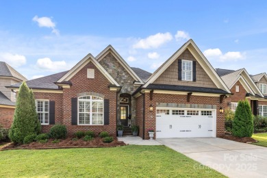 Grand arched stone entry with slate steps and covered porch on Cramer Mountain Country Club in North Carolina - for sale on GolfHomes.com, golf home, golf lot