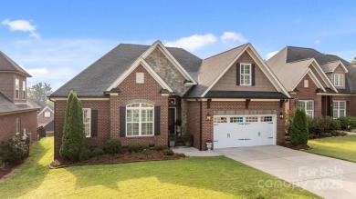 Grand arched stone entry with slate steps and covered porch on Cramer Mountain Country Club in North Carolina - for sale on GolfHomes.com, golf home, golf lot