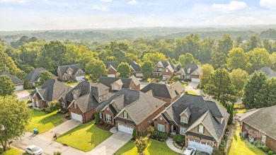 Grand arched stone entry with slate steps and covered porch on Cramer Mountain Country Club in North Carolina - for sale on GolfHomes.com, golf home, golf lot
