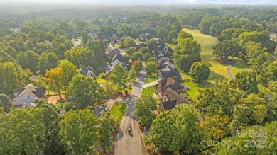 Grand arched stone entry with slate steps and covered porch on Cramer Mountain Country Club in North Carolina - for sale on GolfHomes.com, golf home, golf lot