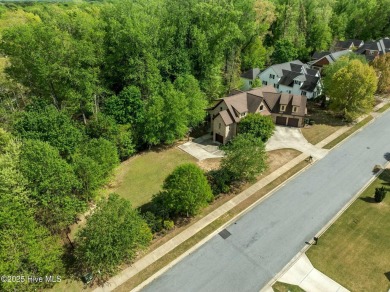 Located in the Ironwood Golf and Country Club, this stunning on Ironwood Golf and Country Club in North Carolina - for sale on GolfHomes.com, golf home, golf lot