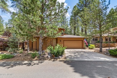 This coveted, brand-new remodel showcases exceptional quality on Forest Highlands Golf Club - The Canyon in Arizona - for sale on GolfHomes.com, golf home, golf lot