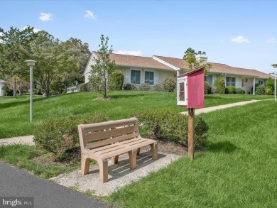 This charming single-level duplex is situated on a tranquil on Leisure World Golf Club in Maryland - for sale on GolfHomes.com, golf home, golf lot