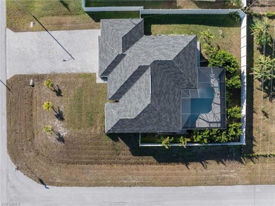 This home is a newer construction (built in 2022), offering on Burnt Store Golf Club in Florida - for sale on GolfHomes.com, golf home, golf lot