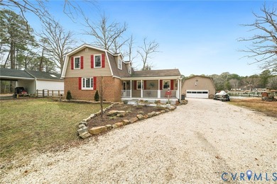 Embrace the art of waterfront living in this timeless retreat on Indian Creek Yacht and Country Club in Virginia - for sale on GolfHomes.com, golf home, golf lot