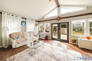 Embrace the art of waterfront living in this timeless retreat on Indian Creek Yacht and Country Club in Virginia - for sale on GolfHomes.com, golf home, golf lot