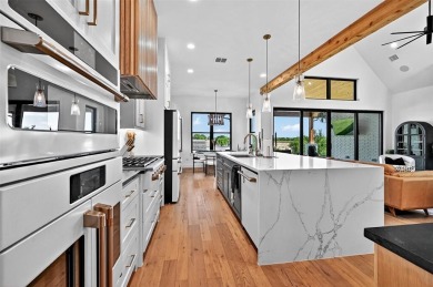 Experience modern luxury at 2028 Fox Bend Trace, a new custom on The Bridges Golf Club in Texas - for sale on GolfHomes.com, golf home, golf lot
