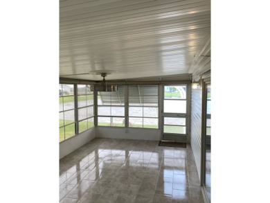 This home stands out from the rest. Three bedrooms, two baths on Sabal Springs Golf and Racquet Club in Florida - for sale on GolfHomes.com, golf home, golf lot