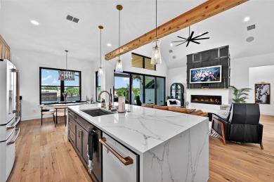 Experience modern luxury at 2028 Fox Bend Trace, a new custom on The Bridges Golf Club in Texas - for sale on GolfHomes.com, golf home, golf lot