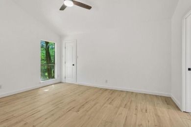 Welcome to this charming 2-bedroom, 2-bathroom home nestled in on Hide-A-Way Lake Golf Course in Texas - for sale on GolfHomes.com, golf home, golf lot