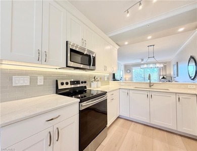 Welcome to this beautifully renovated condo in Naples Heritage on Naples Heritage Golf and Country Club in Florida - for sale on GolfHomes.com, golf home, golf lot