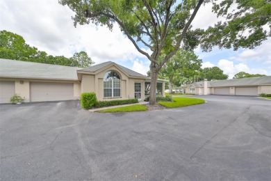 **CLICK ON VIRTUAL TOUR ABOVE** Maintenance FREE Living in the on The Golf Club of Cypress Creek in Florida - for sale on GolfHomes.com, golf home, golf lot